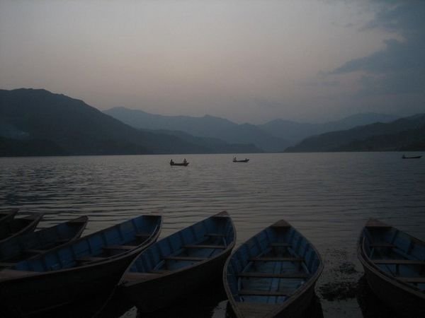 Boats on the lake in the evening at Pokhara