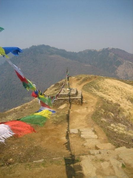 Tibetan prayer flags along the ridge.