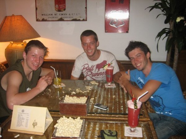 The boys at The Long Bar in Raffles Hotel