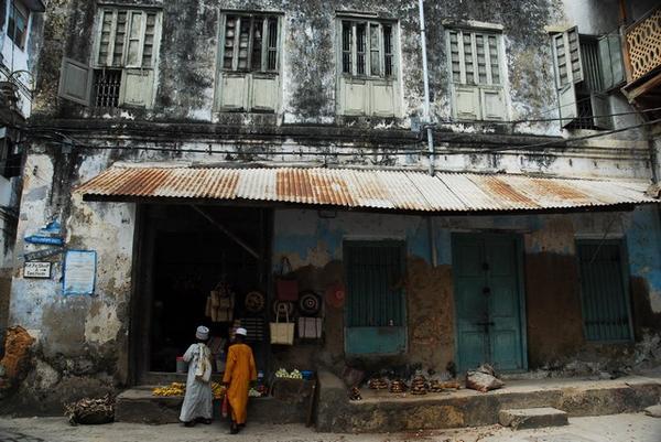 Kids in front of shop · Stone Town, Zanzibar
