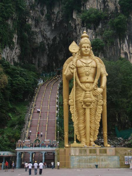 The huge golden statue a the caves