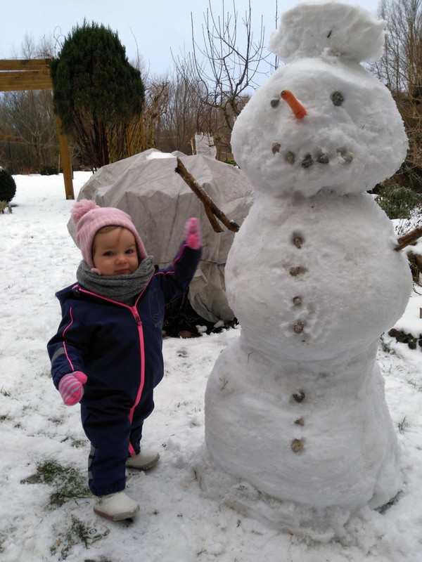Millie and her buddy snowman