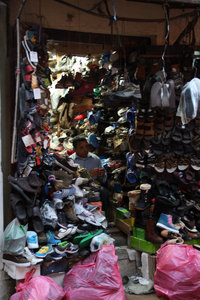 quite a few pairs of shoes for sale...