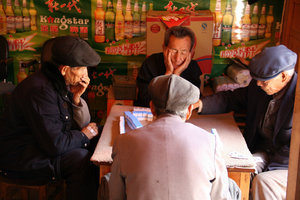 local men playing games in Baisha