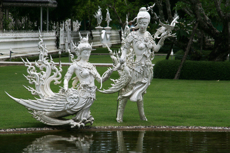 statues at the White Temple