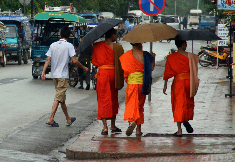 monks walking the streets of Luang Prabang