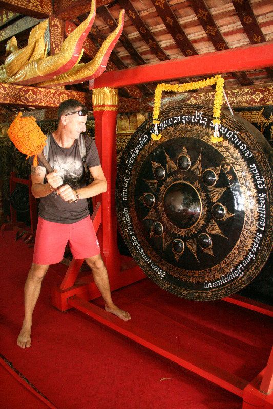 checking out the drum at Wat Xieng Thong