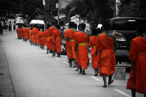 monks collecting alms in Luang Prabang