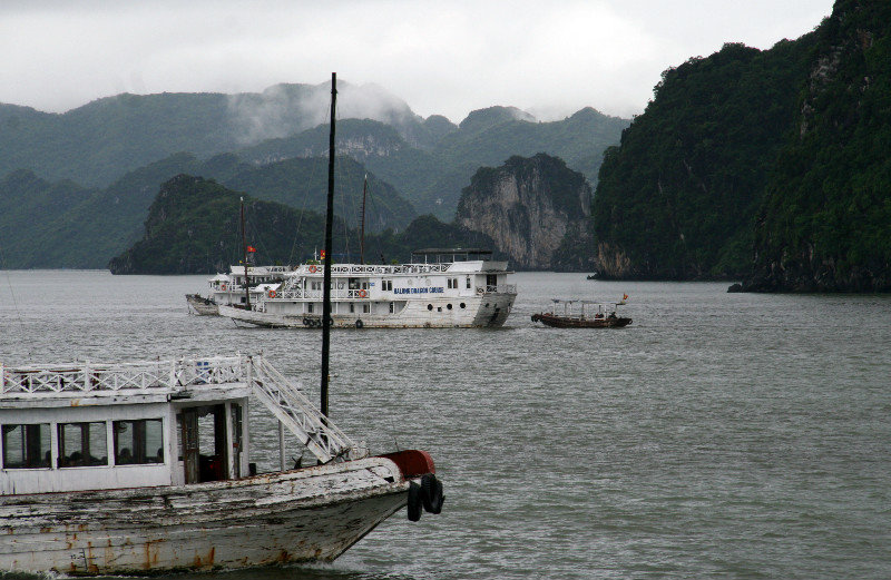 quite a few old looking boats at Halong Bay
