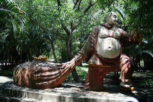 some unusual Buddha statues around the Mua Cave pagoda