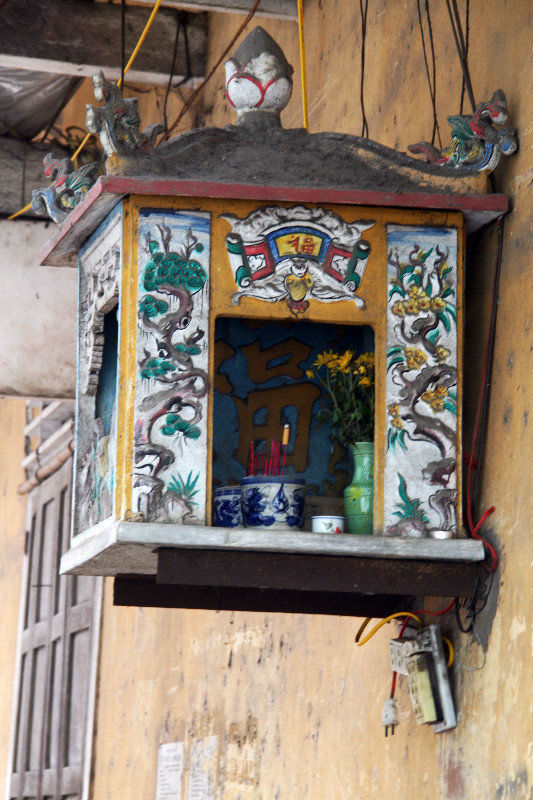 little shrine at one of the side streets in Hue