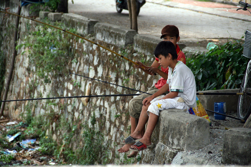 boys fishing around the citadel