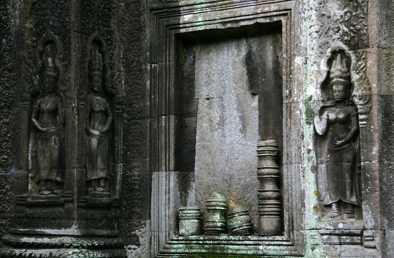 beautiful carvings of apsaras all around in Ta Prohm