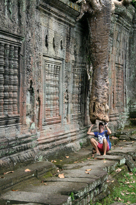 checking out tree roots at Preah Khan