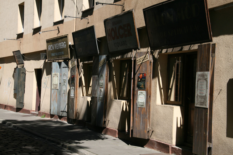 Old shop signs with owners' names in Kazimierz