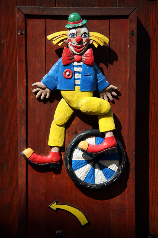 ...and another wooden toy inviting people to visit their shop!