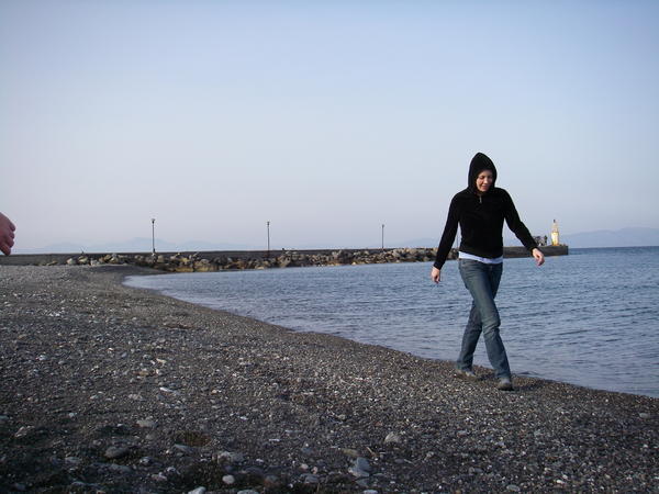 Jess strutting on the beach