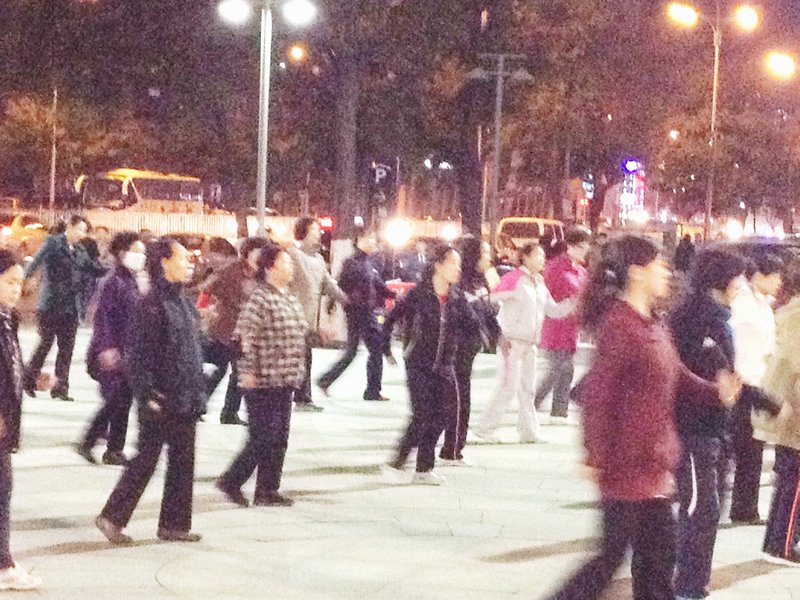 Group dancing in the plaza