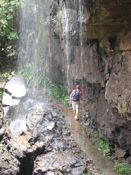 taking a shower with nature as we walk under a water fall
