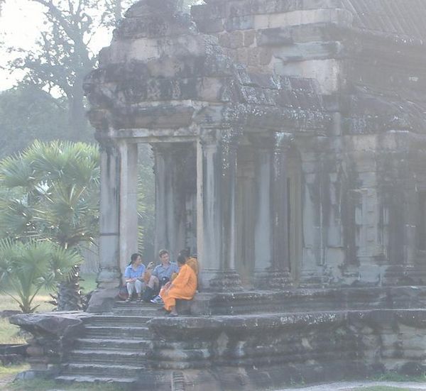 Monks talking with the tourists: Angkor Wat