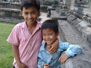 little kids with huge smiles: Angkor Wat