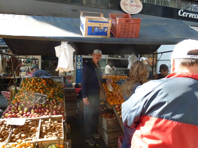 Leigh buying fruit at the market