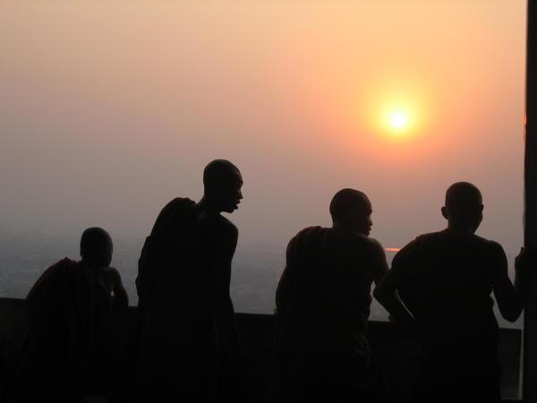 Monks watching the sunset