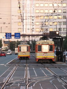 trams by dusk