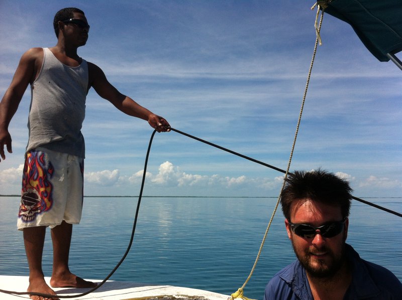 Denroy manhandling the boat, not the man