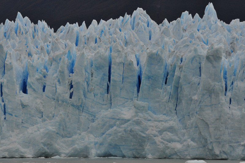 The deeper blue colour is densely packed ice