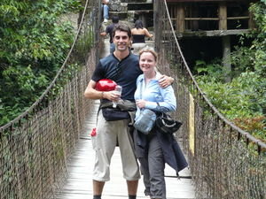 Us on the rickety(!) suspension bridge by El Pailon Del Diablo Waterfall