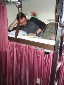 Kris relaxing on his bunk on the overnight train