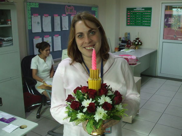 Kate with the flowers she was given from the kids