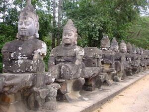 some of the 54 gods that guard the Angkor Thom temple complex
