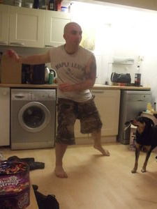 Mark dances in the kitchen