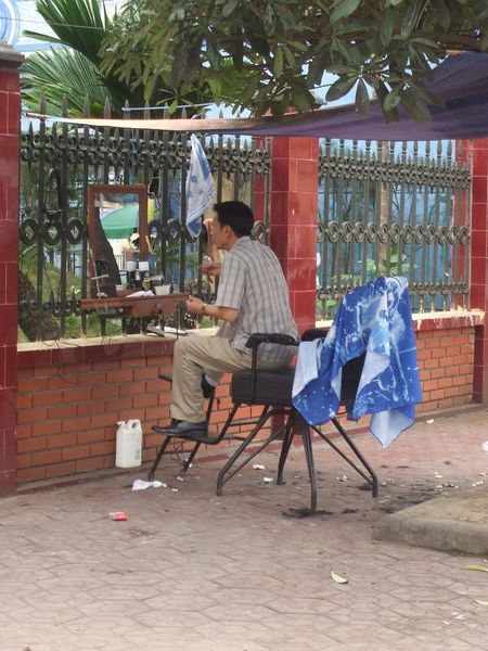 Outdoor barber having a shave