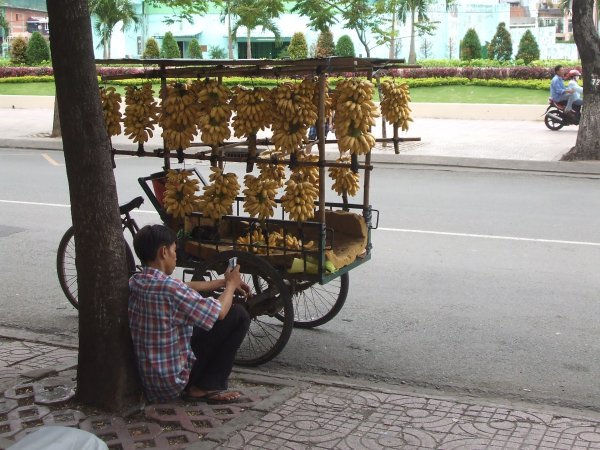 Banana seller on the streets on Saigon