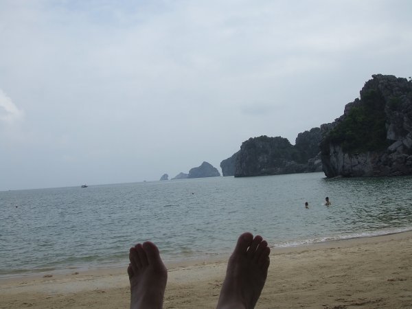 Feet enjoying a day on the beach
