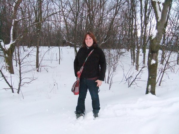 Kate ankle deep in snow
