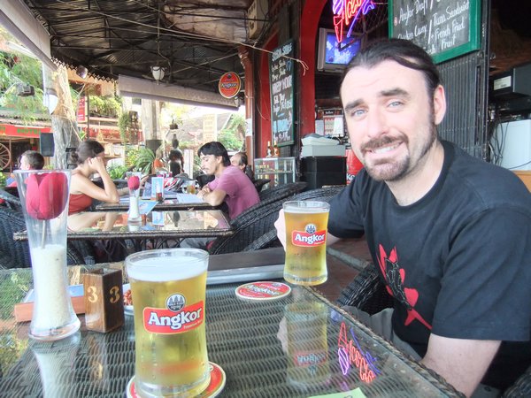 Enjoying a happy hour Angkor beer on arrival in Phnom Pehn