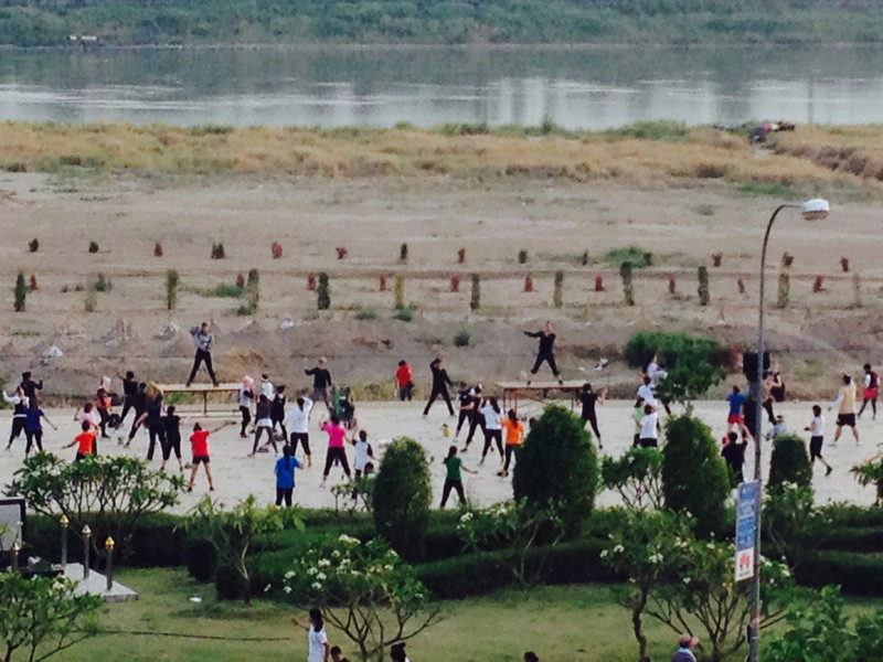 Aerobics is still done next to the river in the evening