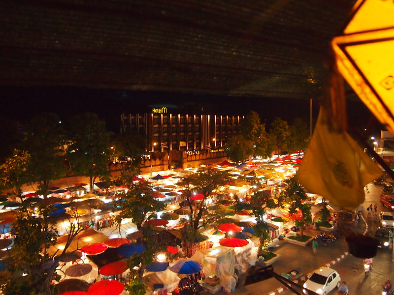 View of night market from roof top bar