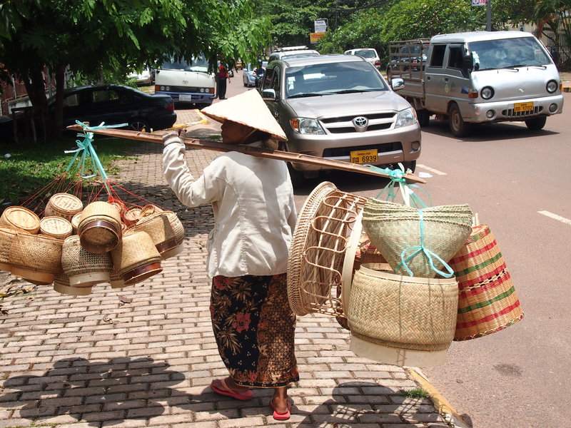 Lao lady selling bamboo baskets
