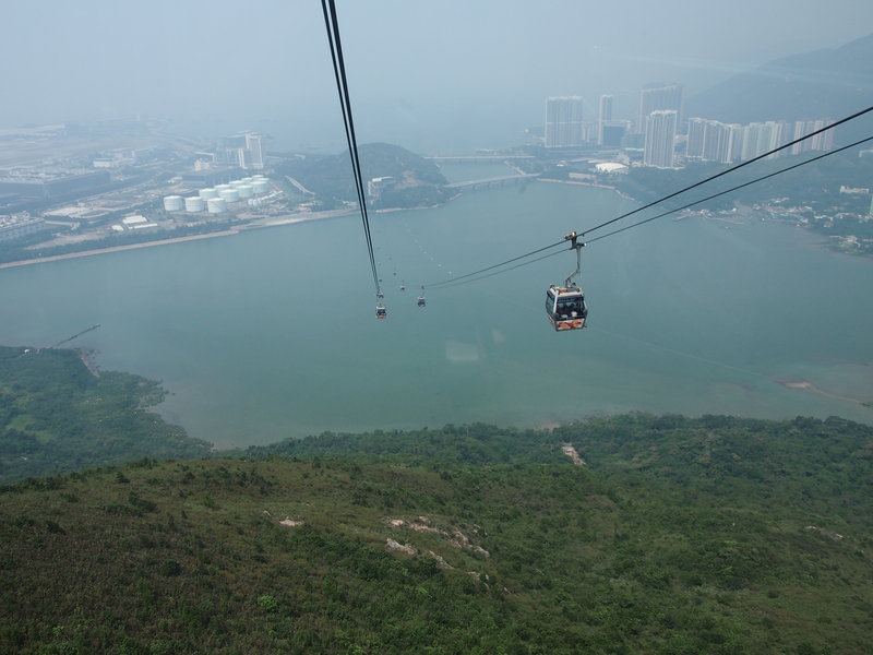 View going up mountains on cable car