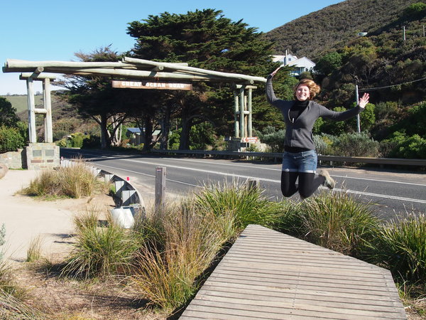 Jumping in front of Great Ocean Road Memorial Arch