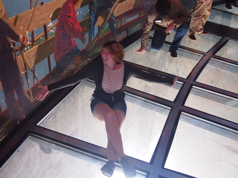 Casually hanging out on glass floor 
