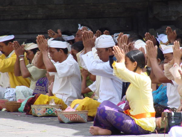 People at a ceremony at the Mother Temple