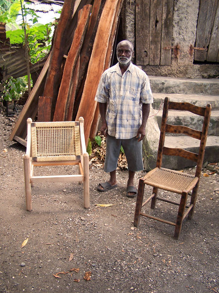 Ludger Jean from Petite Rivière de Nippe,  proudly presenting his wicker creations