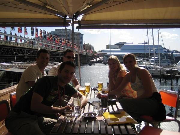 Drinking Stella at Darling Harbour