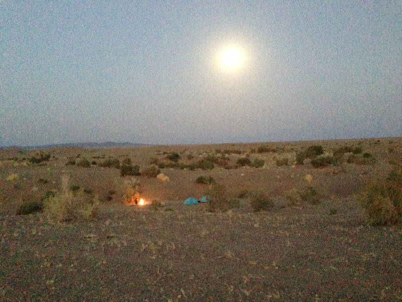 Looking back over the camp with the moon setting